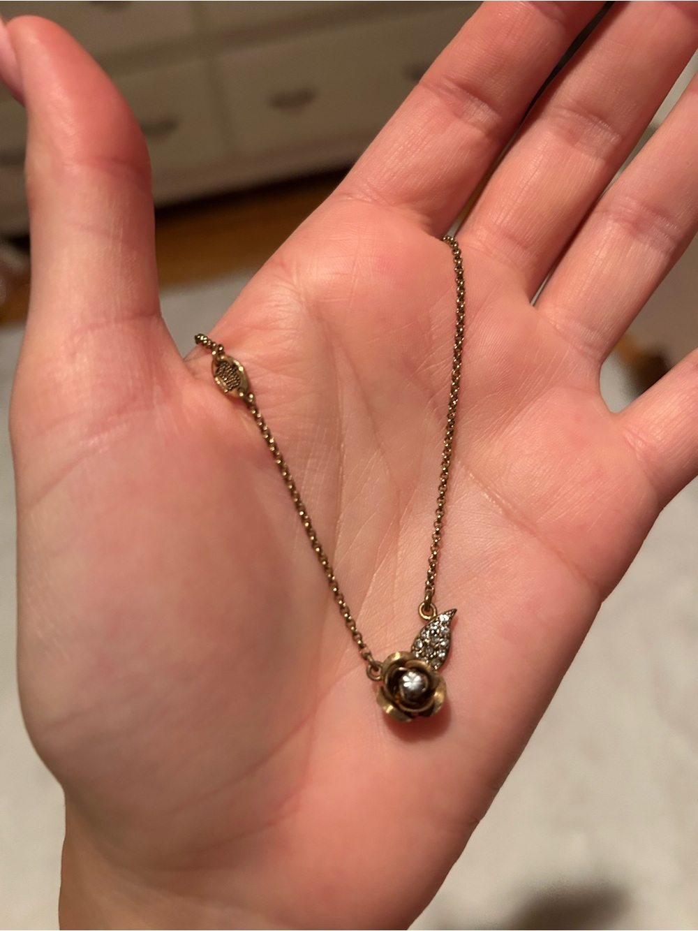Juicy Couture Gold-Tone Rose Pendant Necklace with Crystal Leaf